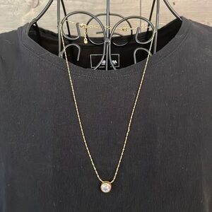 EUC Avon/MARK cubic zirconia and pendant with rope, chain and adjuster